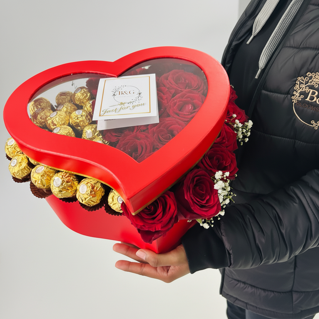 Blooms and Gifts heart shaped boxed bouquet with branded jacket